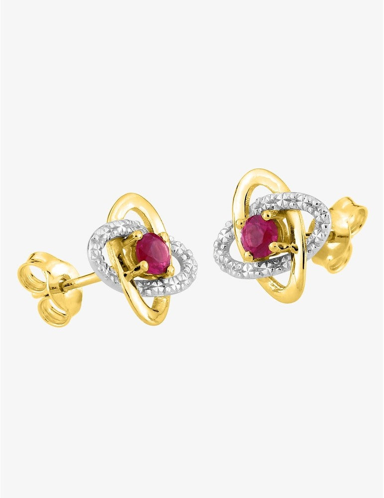 Boucles d'oreilles clous or jaune 375 ‰ rhodium et rubis serti griffes