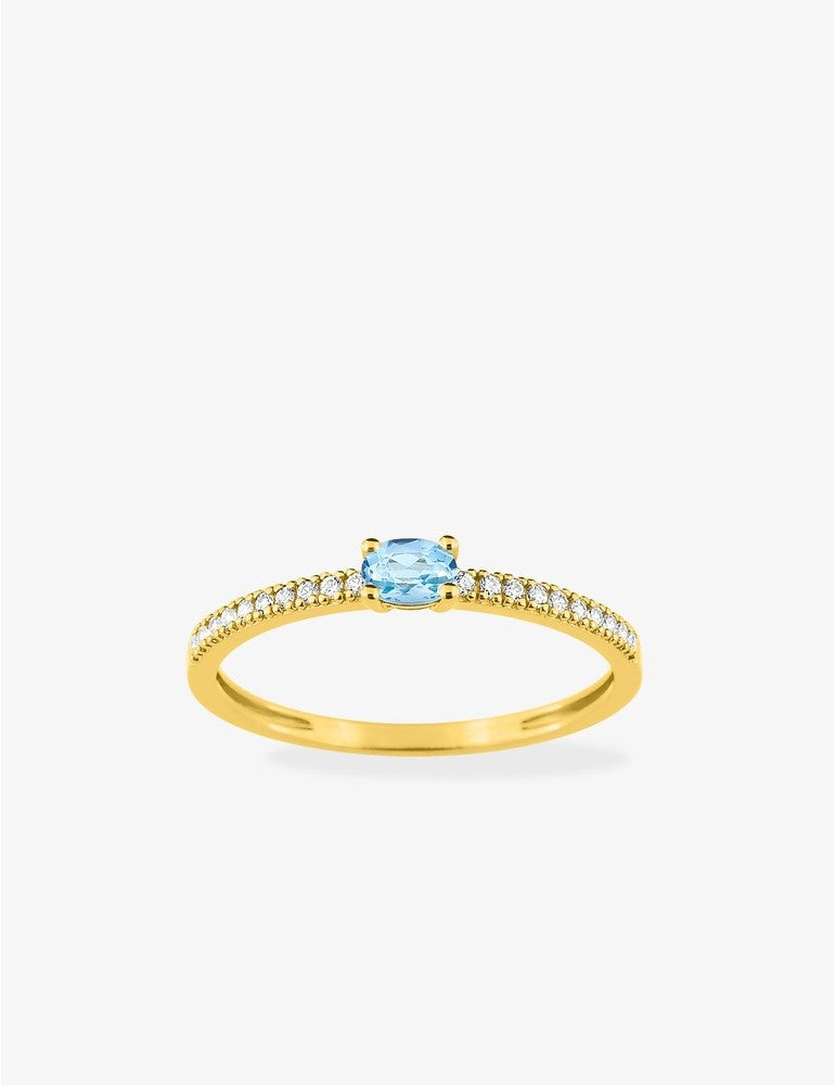 Bague en or jaune 375‰, topaze éclatante et oxydes