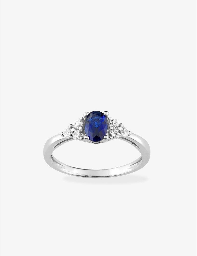 Bague solitaire accompagné argent rhodié 925 ‰ et oxyde de zirconium bleu foncé
