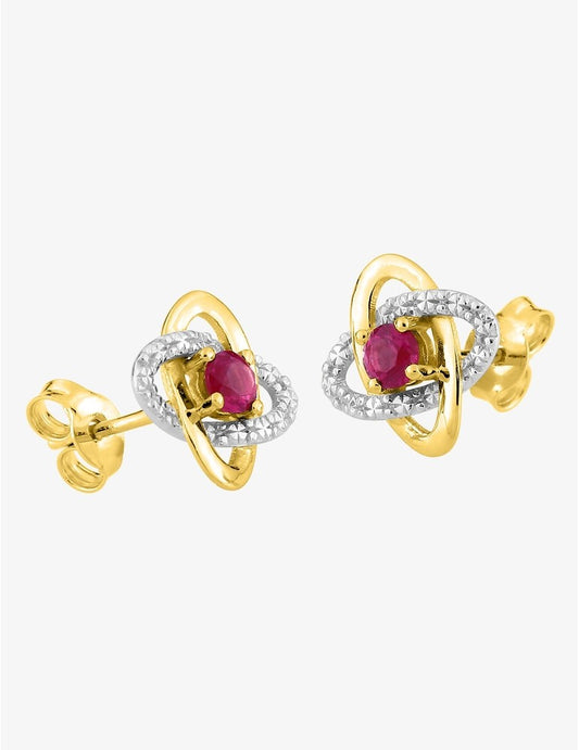 Boucles d'oreilles clous or jaune 375 ‰ rhodium et rubis serti griffes