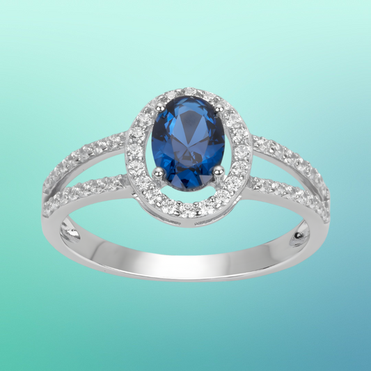 Bague Entourage en Argent 925‰ avec Pierre Bleue et Oxydes Blancs