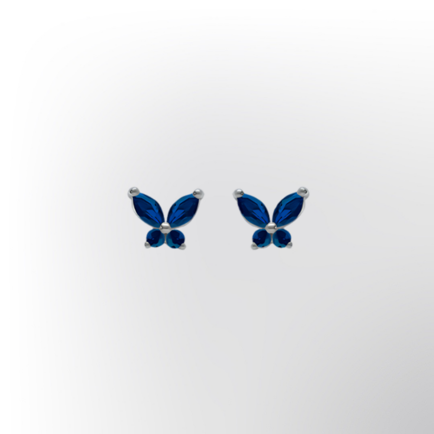 Boucles d’oreilles papillon en argent rhodié – Oxydes bleu foncé sertis