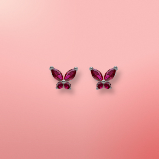 Boucles d’oreilles papillon en argent rhodié et oxydes fuchsia