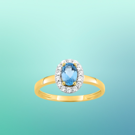 Bague princesse or jaune 375‰, topaze ovale et oxydes