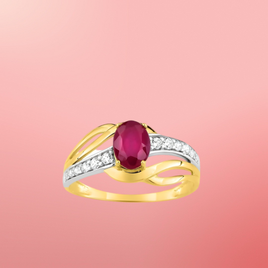 Bague or jaune 375‰ avec rubis ovale et oxydes