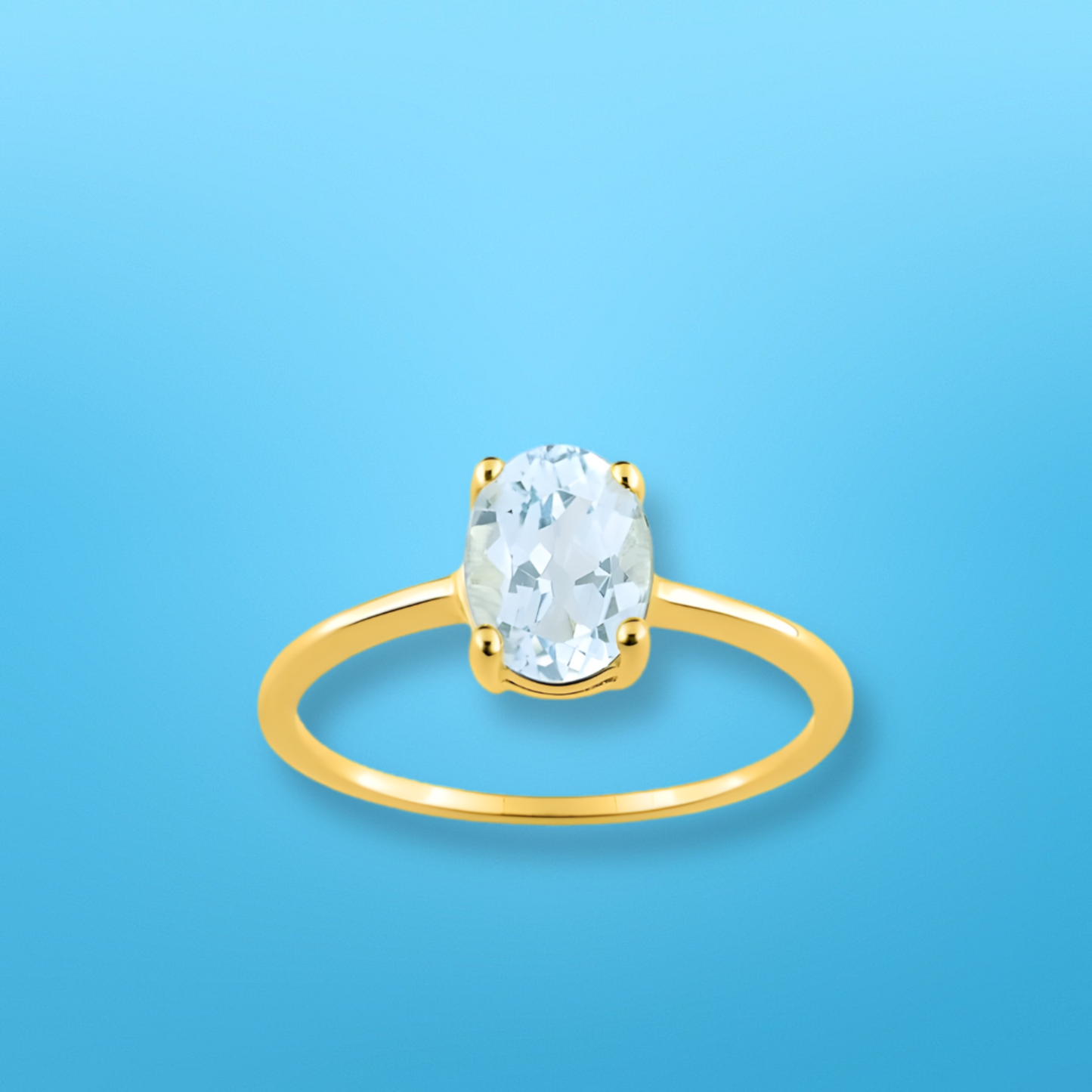 Bague en or jaune 375‰ et aigue-marine ovale