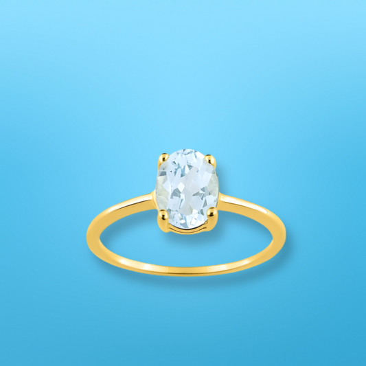 Bague en or jaune 375‰ et aigue-marine ovale